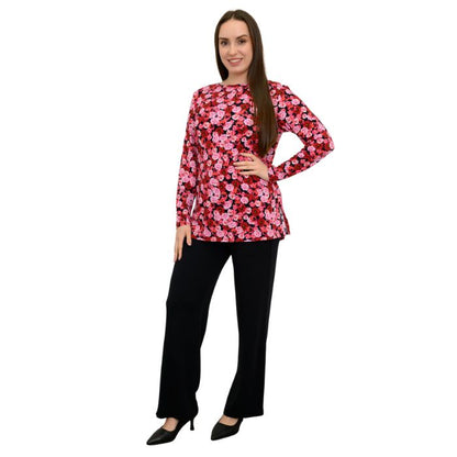 a woman wearing vermillion rose print margie top and black daya pants front view set on a studio white background