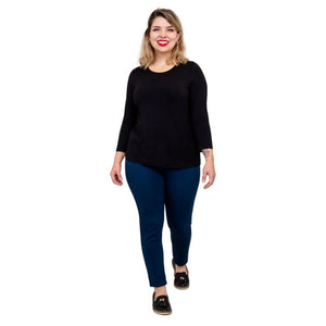 model wearing margorie black three quarter sleeve top black and nadia indigo blue pants front view on white background