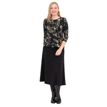 female model wearing margorie khaki oak three quarter sleeve top print and gillian black long skirt front view on white background