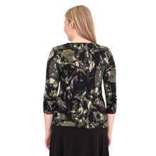 top of female model wearing margorie  khaki oak three quarter sleeve top print back view on white background
