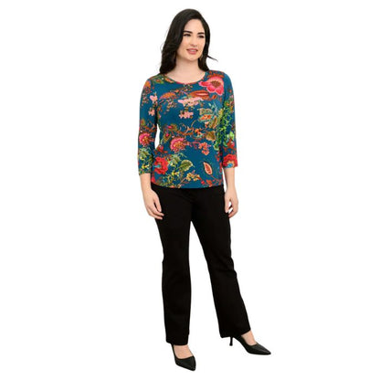 female model wearing teal fantasy print margorie three quarter sleeve top and black daya pants front view on white background