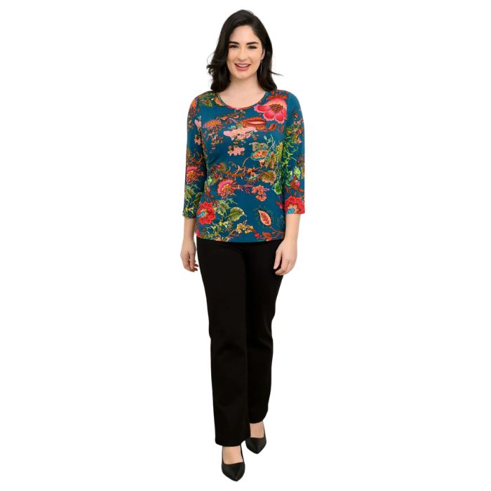 female model wearing teal fantasy print margorie three quarter sleeve top and black daya pants front view on white background