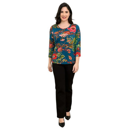 female model wearing teal fantasy print margorie three quarter sleeve top and black daya pants front view on white background