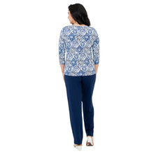 female model wearing margorie zesty print three quarter sleeve top and clair  indigo blue pants front view on white background