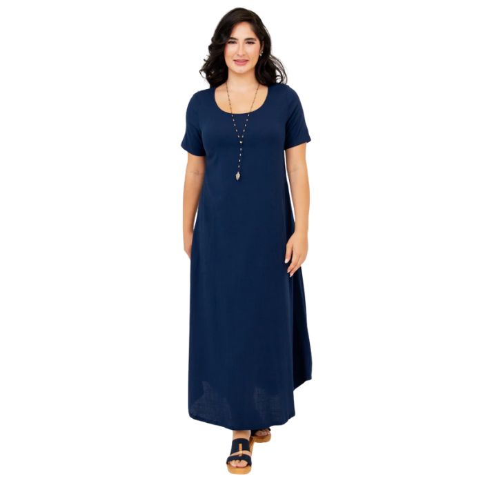 female model wearing indigo blue martha dress front view on white background