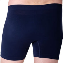 body of male model wearing ink blue boxer briefs back view on white background