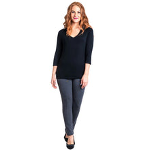 female model wearing mia black three quarter sleeve top and nadia granite grey pants front view on white background