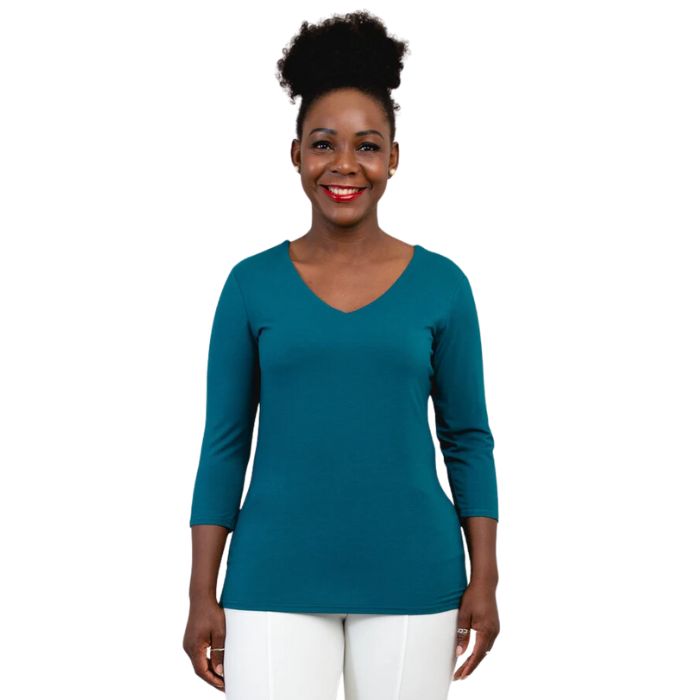 top half of female model wearing mia teal green three quarter sleeve top front view on white background