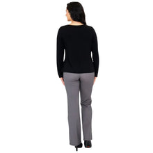female model wearing mona black long sleeve top and daya pants back view on white background