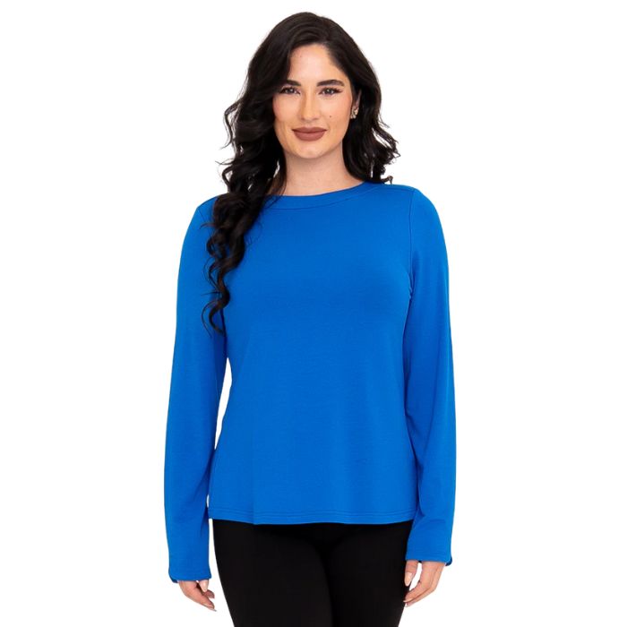 top of female model wearing mona cobalt blue long sleeve top front view on white background