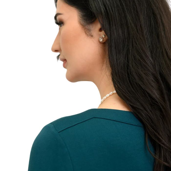 woman wearing crystal teal mona top close up view of shoulder design