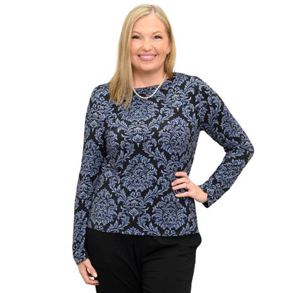 woman wearing indigo empire print mona top waist up front view set on a white background