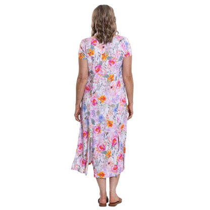 female model wearing pink bouquet print morgan dress back view on white backgreond