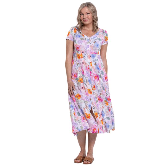 female model wearing pink bouquet print morgan dress front view on white backgreond