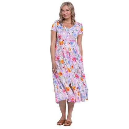 female model wearing pink bouquet print morgan dress front view on white backgreond