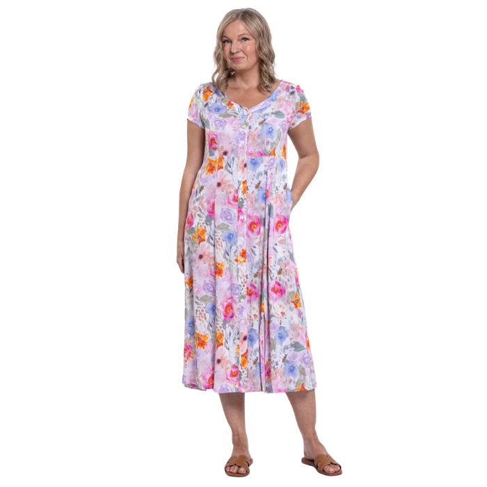 female model wearing pink bouquet print morgan dress front view on white backgreond