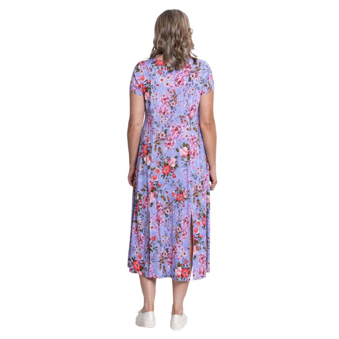 female model wearing red rosebud print morgan dress back view on white backgreond