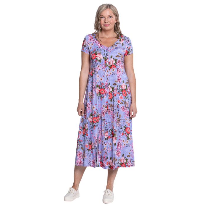 female model wearing red rosebud print morgan dress front view on white backgreond