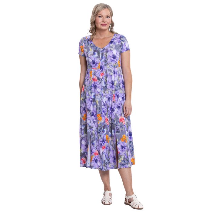 female model wearing violet bloom print morgan dress front view on white backgreond