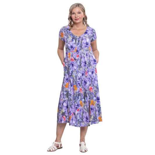 female model wearing violet bloom print morgan dress front view on white backgreond