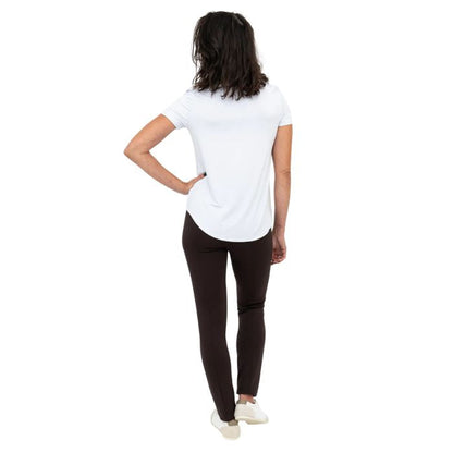 female model wearing coffee brown nadia pants and white tessa top back view on white background