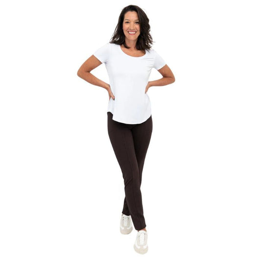 female model wearing coffee brown nadia pants and white tessa top front view on white background