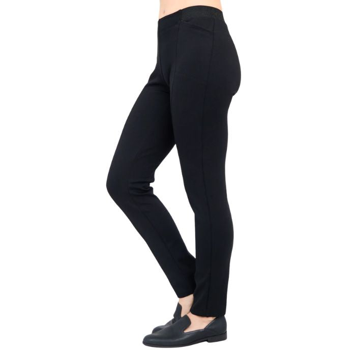 female model weaing black petite nadia pants side view on white background