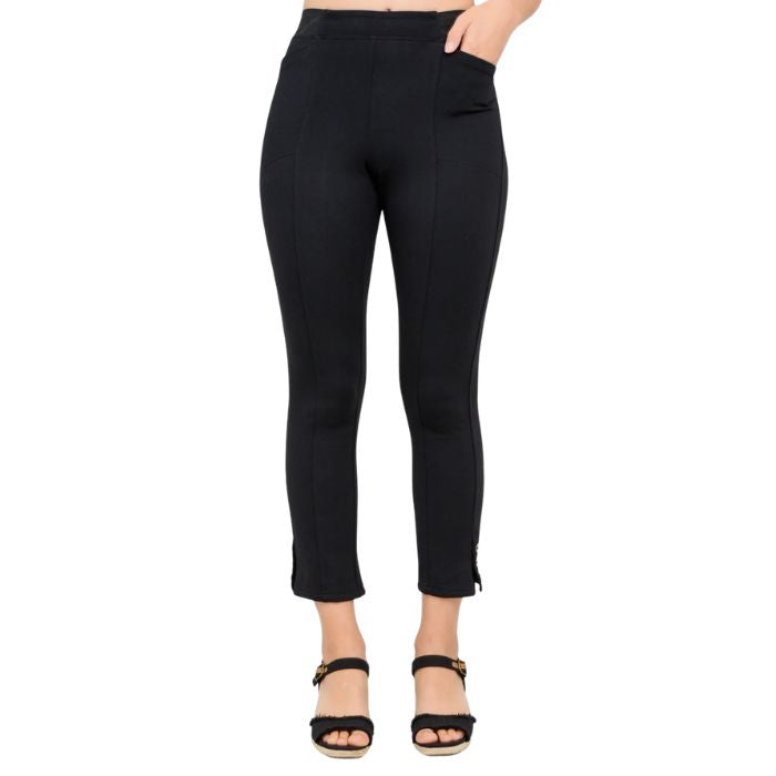 female model wearing black nadine cropped pants front view on white background