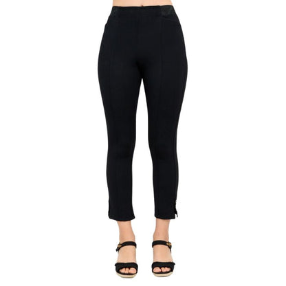 female model wearing black nadine cropped pants front view on white background