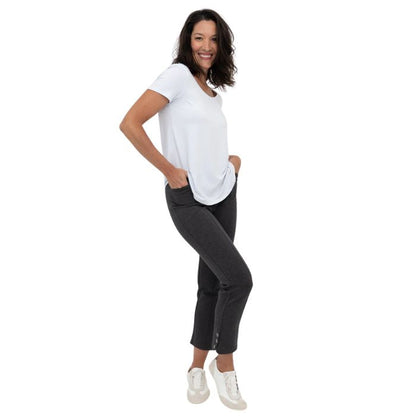 female model wearing granite grey nadine cropped pants and white tessa tee side view on white background