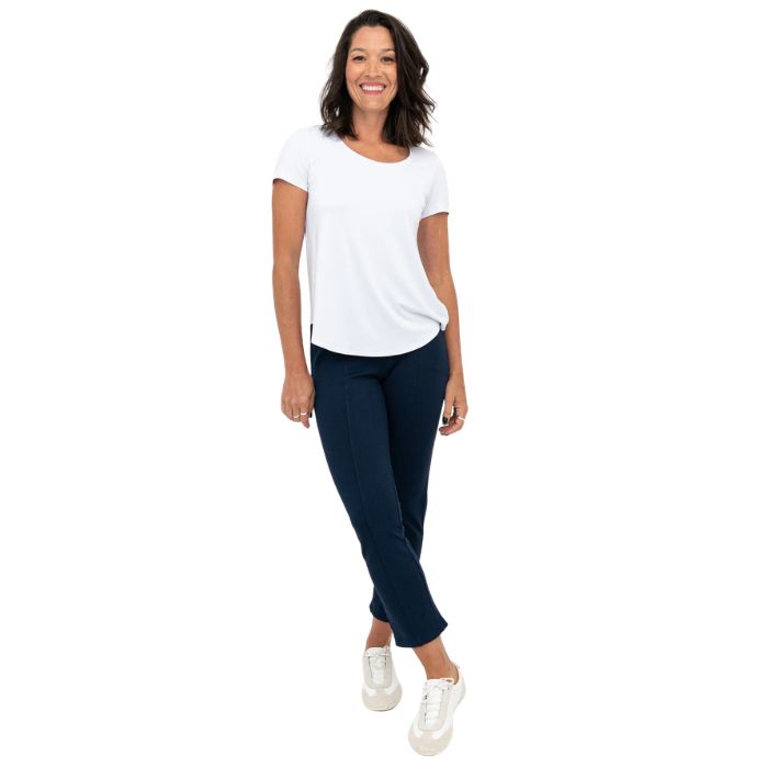 female model wearing indigo blue nadine cropped pants and white tessa tee front view on white background
