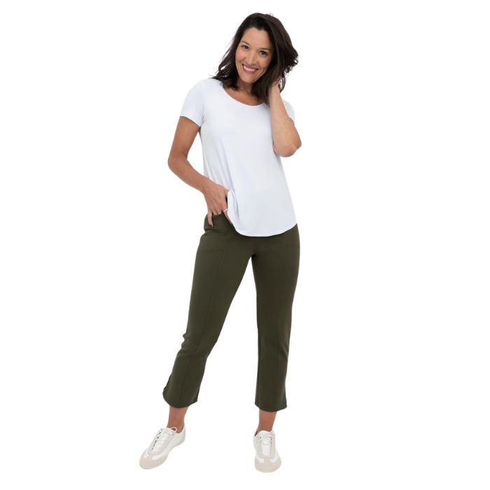 female model wearing khaki green nadine cropped pants and white tessa tee front view on white background