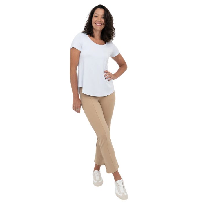female model wearing beige brown nadine cropped pants and white tessa tee front view on white background