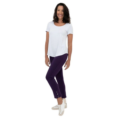 female model wearing royale purple nadine cropped pants and white tessa tee side view on white background