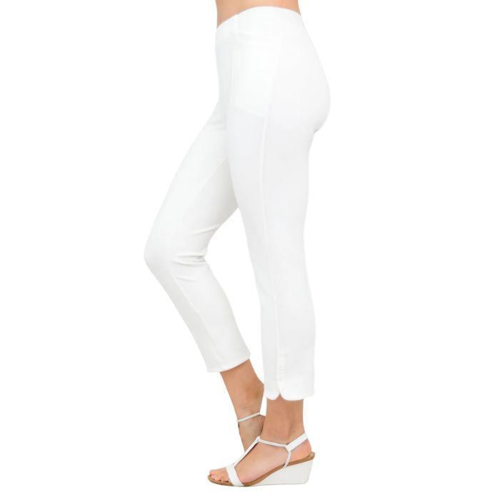 female model wearing white nadine cropped pants side view on white background