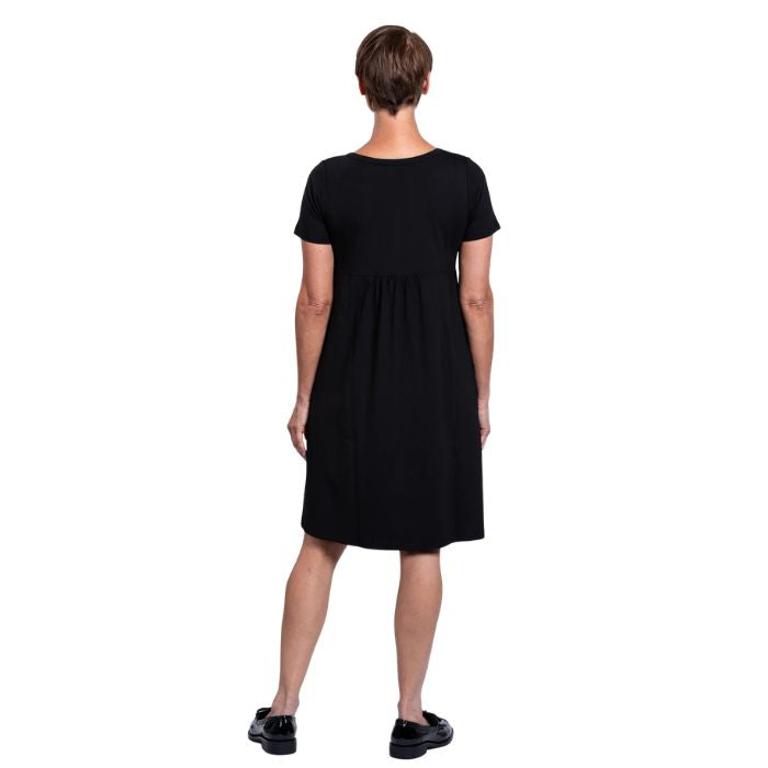 female model wearing black nelly dress back view on white background