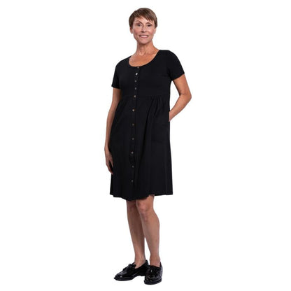 female model wearing black nelly dress front view on white background