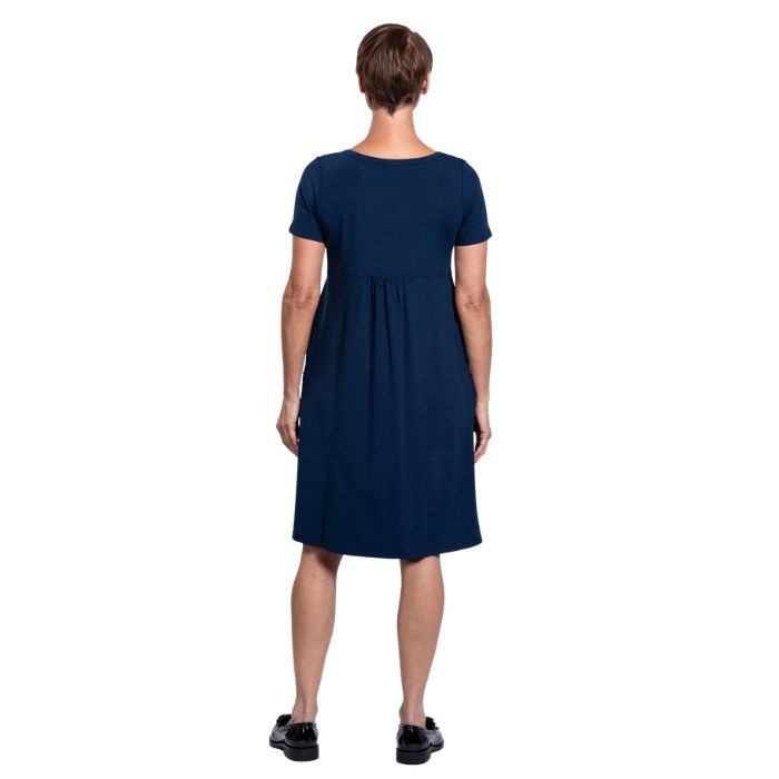 female model wearing indigo blue nelly dress back view on white background