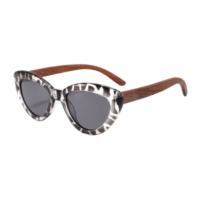 paris sunglasses black and white  tortoise frames and black lenses over view on white background