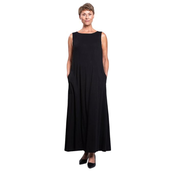 female model wearing black patricia dress front view on white background