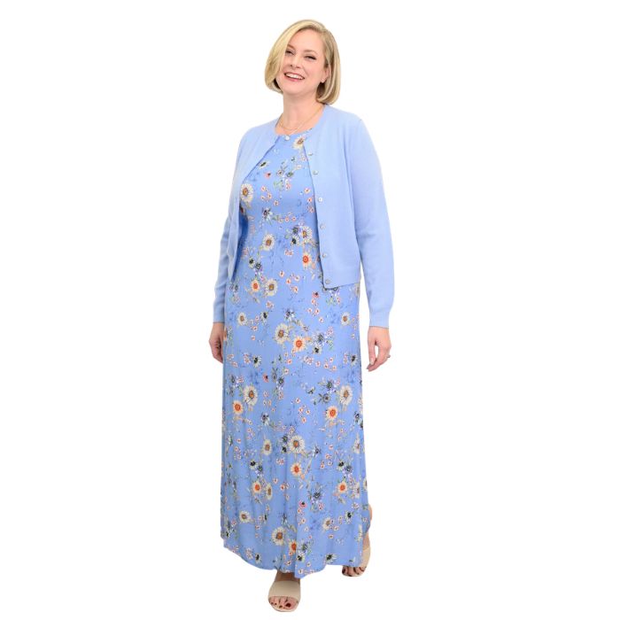female model wearing peri daisy print  patricia dress and blue jessica sweater front view on white background