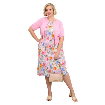 female model wearing pink bouquet print patricia dress and pink shen cardigan front view on white background