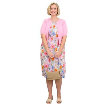 female model wearing pink bouquet print patricia dress and pink shen cardigan front view on white background