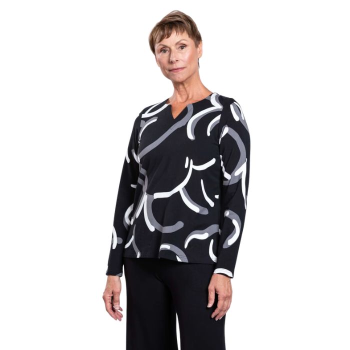 woman wearing black white focus print peggy top front view set on a white background