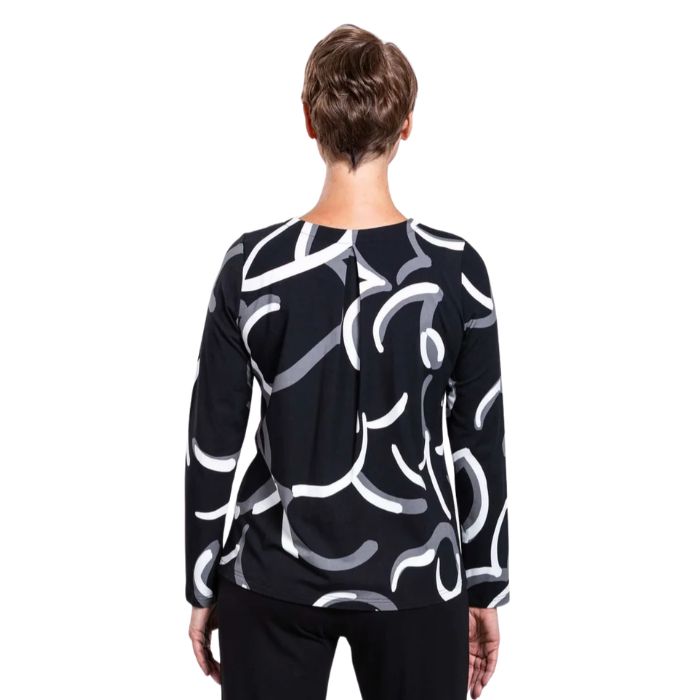 woman wearing black white focus print peggy top back view set on a white background