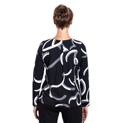 woman wearing black white focus print peggy top back view set on a white background