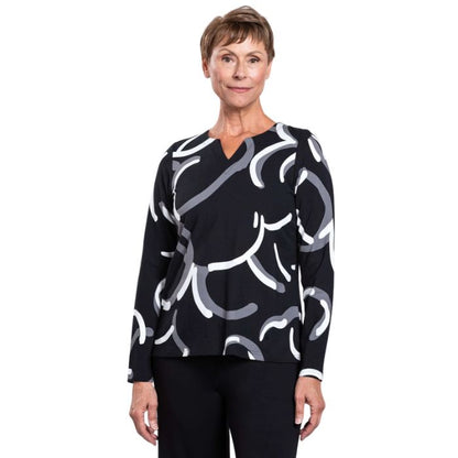 woman wearing black white focus print peggy top front view set on a white background