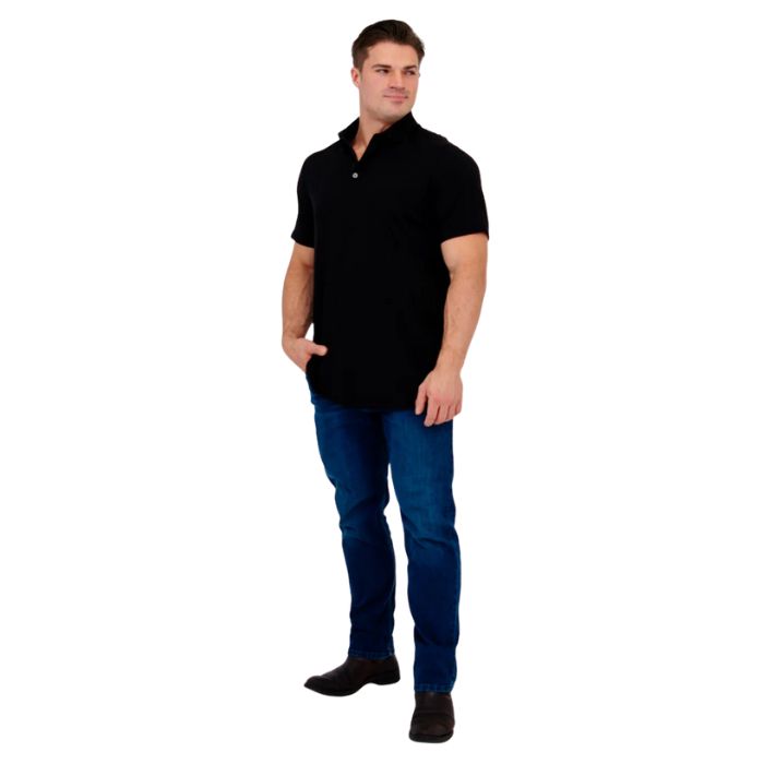 male model wearing black phil polo shirt and blue jeans front view on white background