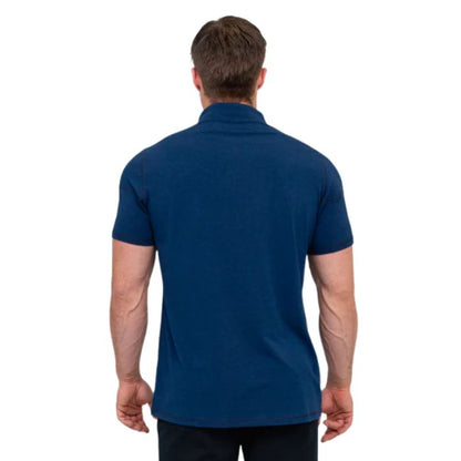 male model wearing indigo blue phil polo shirt back view on white background