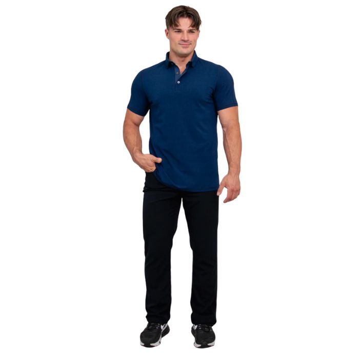 male model wearing indigo blue phil polo shirt and blue jeans front view on white background